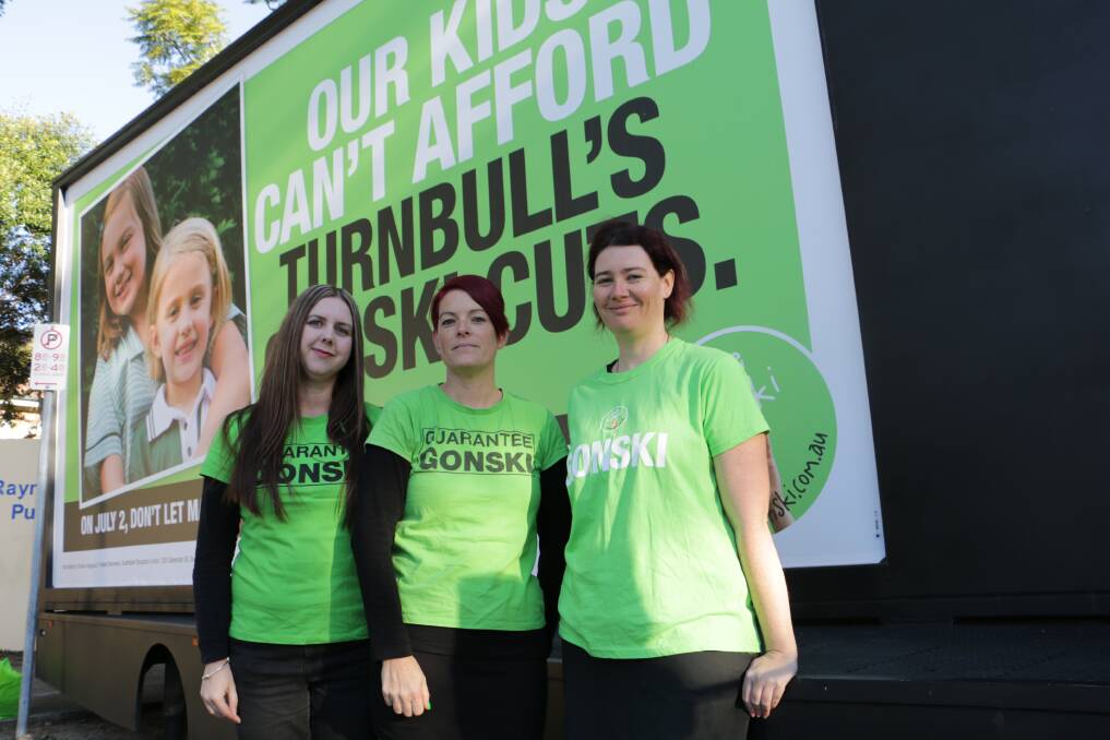 CONCERNED: Laura Mullard, Amy Wales and Rachele Haigh attended the Gonski billboard event in Raymond Terrace on Tuesday morning. Picture: Ellie-Marie Watts