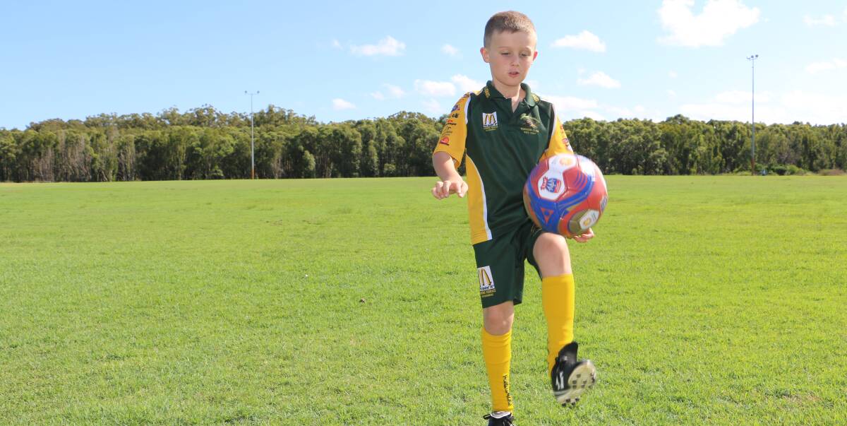 UP AND AWAY: Raymond Terrace soccer player Xander Oxford, 8, has been selected for the Hunter Valley Hawks under nine boys skills acquisition program squad. Picture: Ellie-Marie Watts