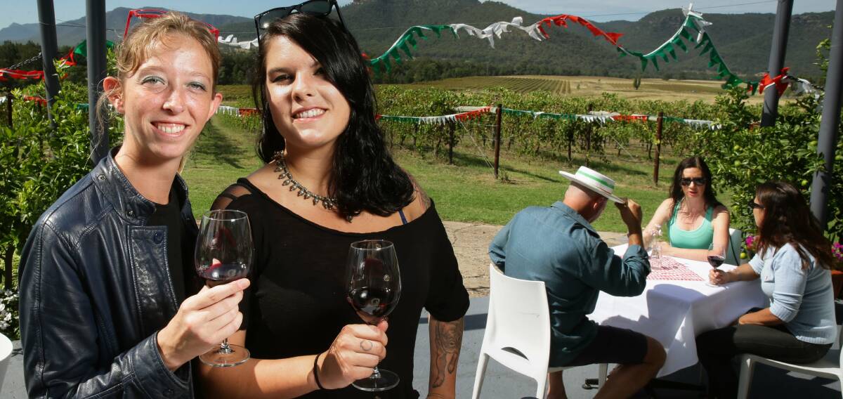 TASTE: Californians Sarah Kennebeck and Lily Ridgleysmith at Mount Broke Wines during the A Little Bit of Italy festival in 2015. Picture: Peter Stoop