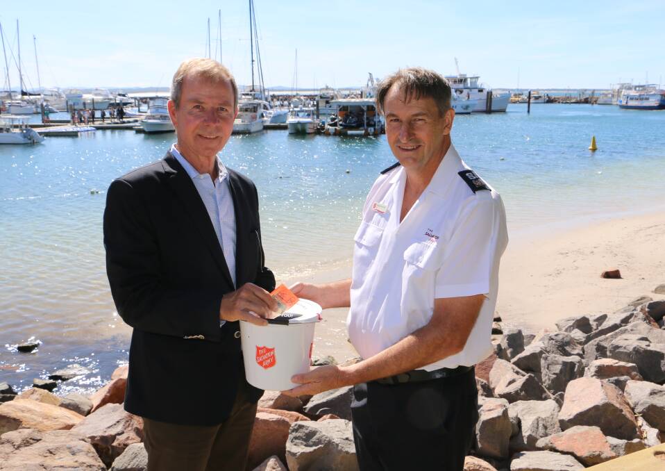 GIVE A LITTLE: Red Shield Appeal volunteer Mark Edmunds with Salvation Army envoy Howard Koutnik in Nelson Bay. Picture: Ellie-Marie Watts