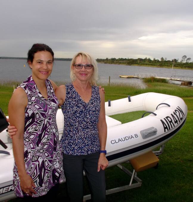 WORTH IT: Claudia Blumer and Annette Messenger with the Sailability Port Stephens' new RIB, Claudia B, which was launched on April 30. Pictures: Supplied