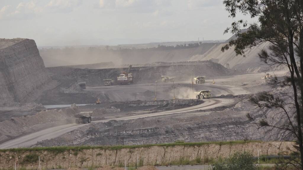 Air quality: Dust from a Hunter coal mine. New Australian air quality standards will require a 50 per cent reduction in pollution emissions from both industry and domestic wood-fired heaters, the NSW Environment Protection Authority says.  