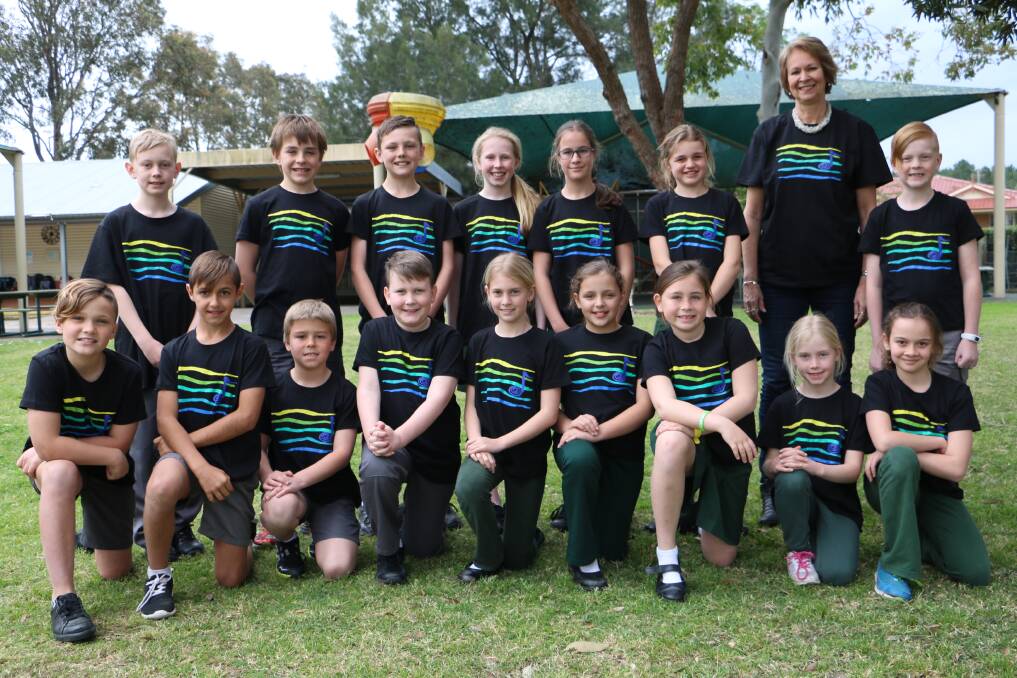 Mt Kanwary Public School students with music teacher Helen Tuyl. The students were recently accepted into the Arts Alive Concert after auditioning to perform at the Sydney Opera House-based show. Pictures: Ellie-Marie Watts
