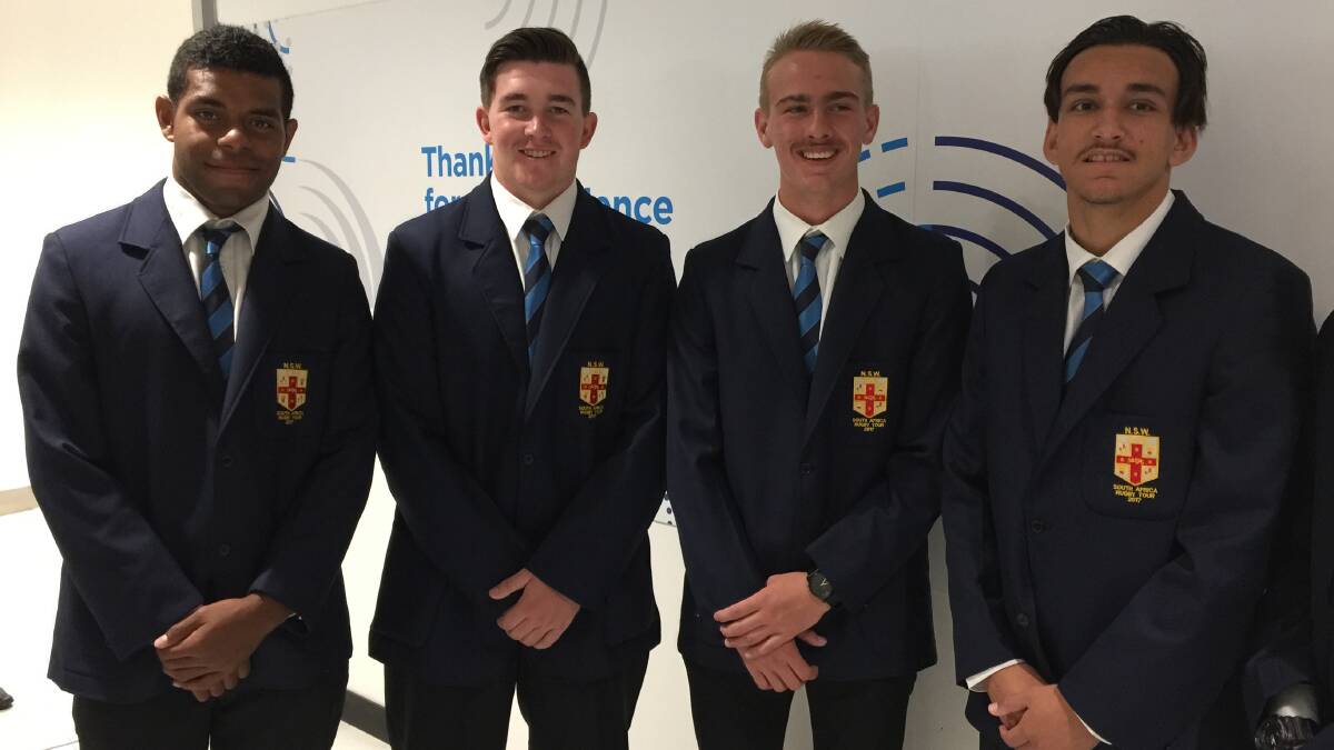 PROUD: Jacob Rabai, Jason Allwood, Jordan Byfield and Ryan Duffy, all 16 years, at Sydney Airport on Sunday before they flew to South Africa as part of the NSW CHS touring team. Picture: Ian Allwood