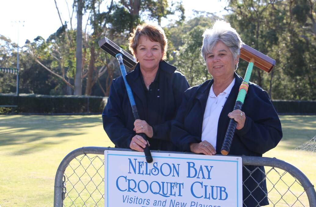 Nelson Bay Croquet Club members Cheryl Lloyd and Sandy Tawa are ready to play in the 2017 Gold Brooch tournament. 