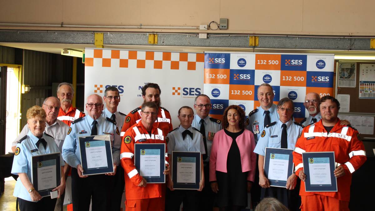 DESERVING: Port Stephens SES Unit members received awards at the NSW State Emergency Service Hunter Region presentation in Maitland on September 23.