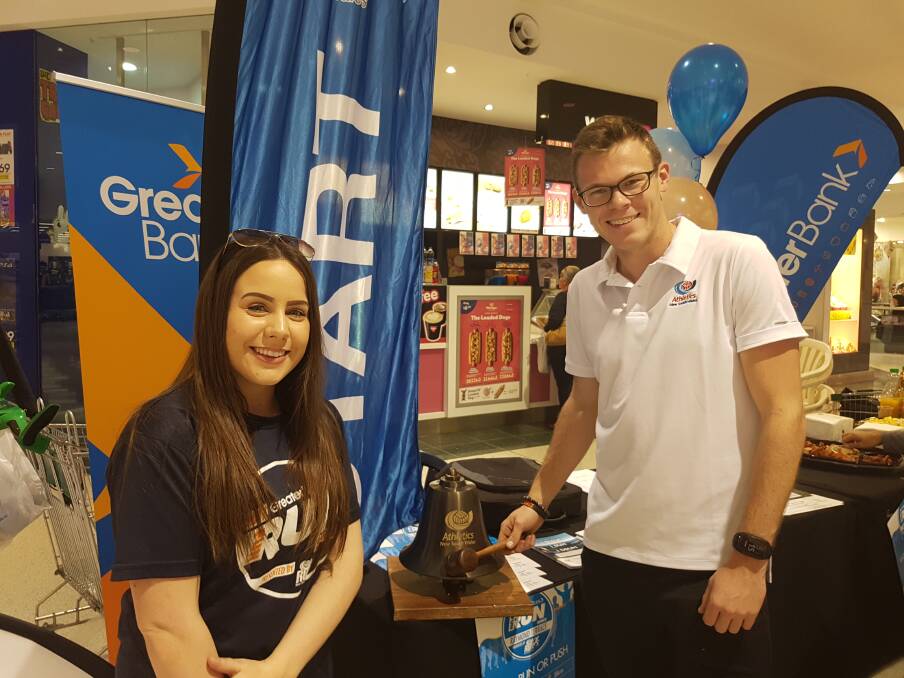 IT'S ON: Laura Carroll and James Constantine from Run NSW at the Raymond Terrace Fun Run launch in MarketPlace on August 10. Picture: Supplied