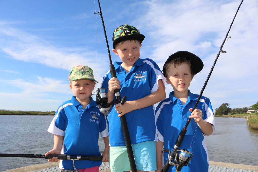 REEL 'EM IN: Hallie Hughes, 3, Zac Hughes, 7, and Ned Hughes, 5, pictured in Raymond Terrace.  Photo: Ellie-Marie Watts
