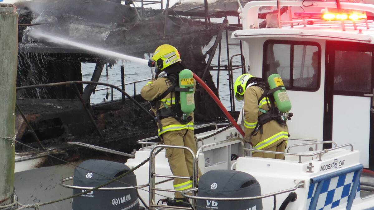 Fire and Rescue NSW firefighters extinguished a boat fire near d'Albora Marinas, Nelson Bay, on May 19.
