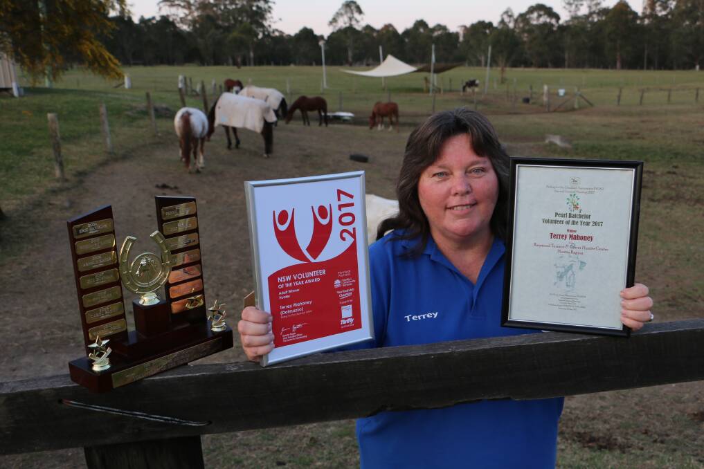 Terrey Mahoney with her three awards: RDA Raymond Terrace’s Duncan Family Trophy, the Hunter-based NSW Volunteer of the Year Award (for the adult category) and RDA NSW’s Pearl Batchelor 2017 Volunteer of the Year Award for the Raymond Terrace and Lower Hunter region.