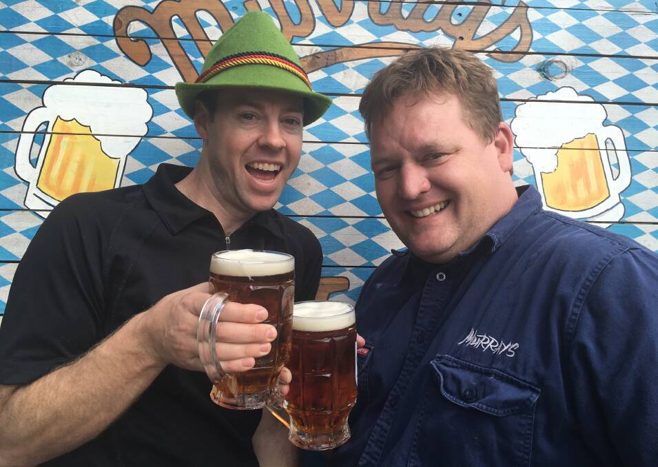 BIG ON BEER: Murray's brewers Sean Costigan and Alex Tucker 'researching' some of their Oktoberfest beer in preparing for the festival.