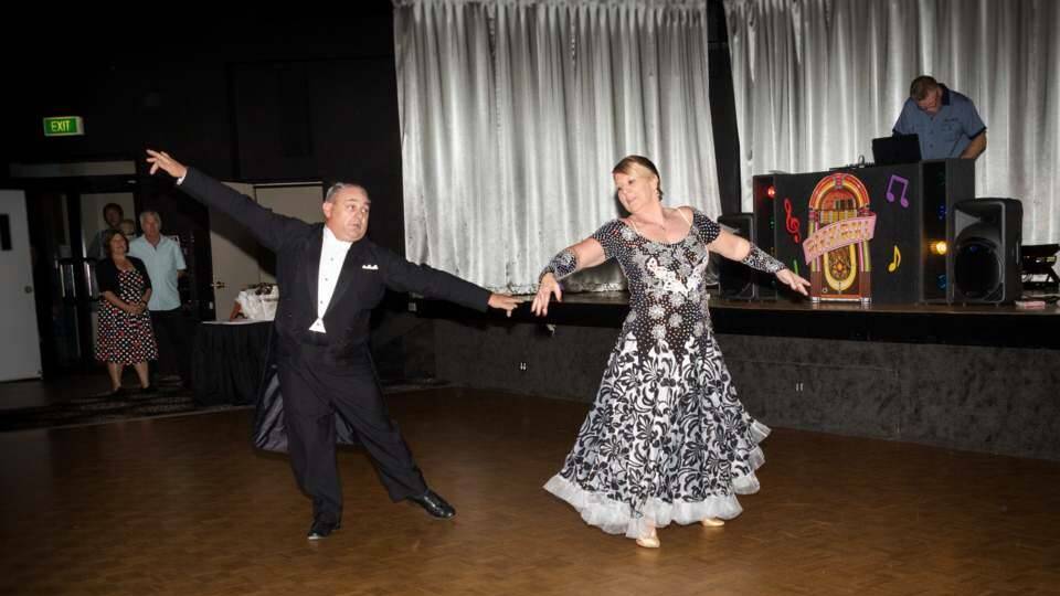 Cheryl and Gary Roberts, the Australasian Old Time Ballroom Dance champions, demonstrating their craft at Soldiers Point Bowling Club on October 7. Picture: Sue Carlton