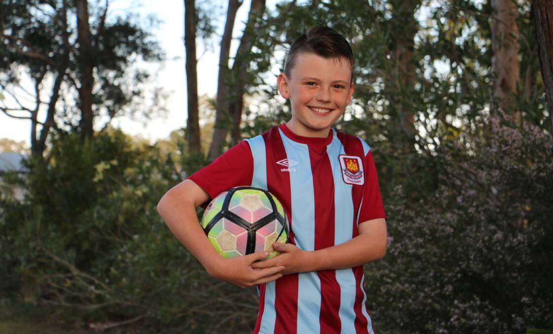 EXCITED: Jett Floyer-Kell, 10, from Medowie has been selected to train and play with the West Ham United youth academy in London. He flies out on Wednesday. Picture: Ellie-Marie Watts