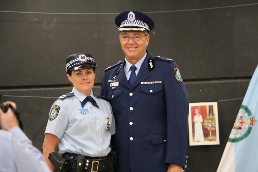 Senior Constable Lisa-Maree Holloway with Assistant Commissioner Max Mitchell APM.