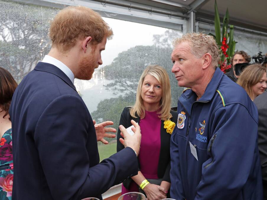 NICE GUY: Prince Harry with Squadron Leader Danny Jeffery, an aeronautical engineer at RAAF Base Williamtown, at the Invictus Games launch in Sydney on June 7. 