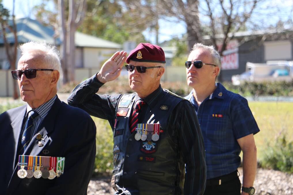Scenes from the Medowie and Nelson Bay Vietnam Veteran's Day services on Friday. Pictures: Ellie-Marie Watts and Sam Norris