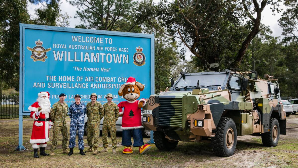 Santa’s arrival in Raymond Terrace will begin with a parade at 10am on Sunday. Santa will arrive at MarketPlace Raymond Terrace in a Bushmaster troop carrier from Williamtown RAAF Base.