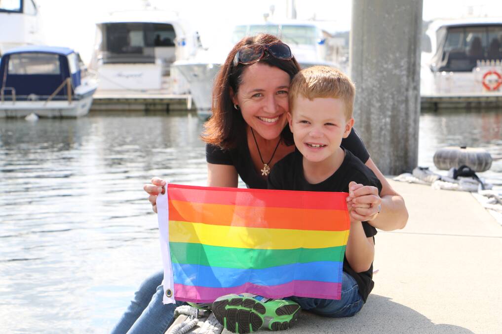 COLOURFUL: Clare Pearson with her son Lachlan, 8. Mrs Pearson has organised a Rainbow Day to raise awareness for autism. Picture: Ellie-Marie Watts