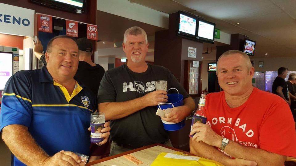 HELPFUL: Craig Warden, Mark Hampson and Jeff Osborne selling Catch Up for Craig raffle tickets at the Spinning Wheel Hotel, Raymond Terrace.