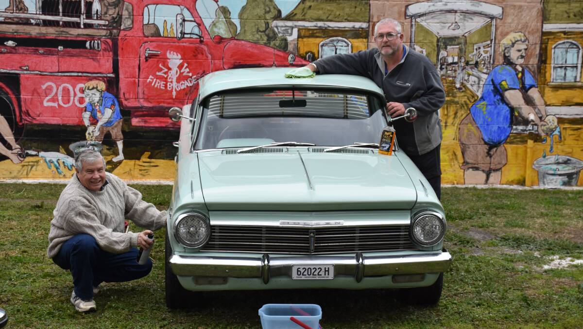 READY: Upper Hunter Motoring Association's Brian Simpson and David Murphy preparing Mr Murphy's car for the Aberdeen Big Boys Toys and Family Day.