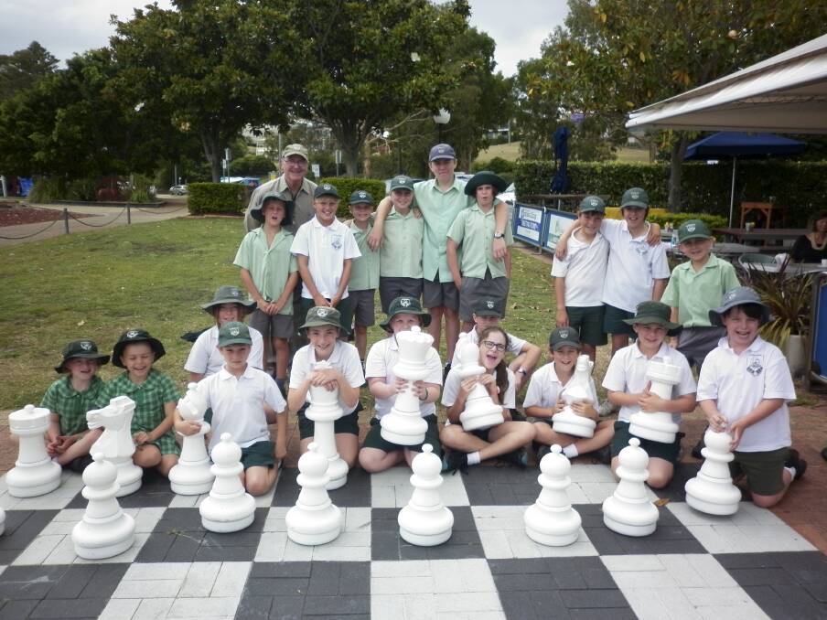 CHECK IT OUT: St Michael's chess club enjoying the giant-sized chess board.