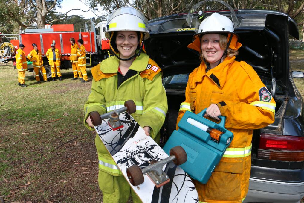BARGAINS: Dalit Hazell and Joanne Ritchie, at Lemon Tree Passage Rural Fire Station, get ready for their car boot sale. Picture: Stephen Wark