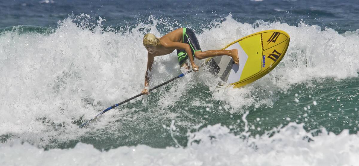 SUPER-SUP: Anna Bay stand-up paddleboarder Joshua Stretton, 12, in action. Picture: Gina Stuart Photography