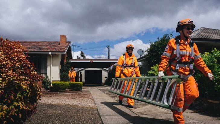 ACT SES at a home in Downer after repairing a leaking roof on Thursday. Photo: Rohan Thomson