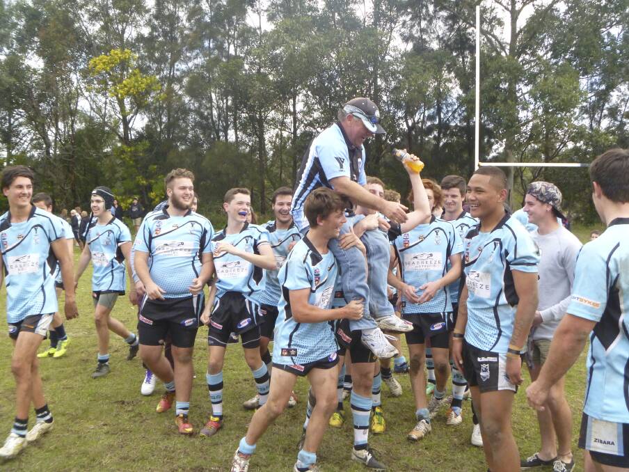 ELATED: Port Stephens Sharks under-18 side celebrate winning the grand final. Picture: Tina Cornally