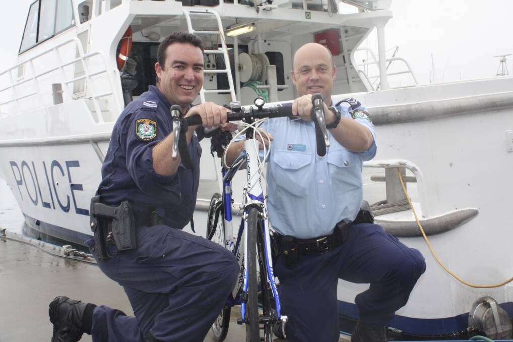 BEST FOOT: Senior constables Nick Leach and Luke Rogers prepare for the NSW Police Legacy bike ride. Picture: Charles Elias