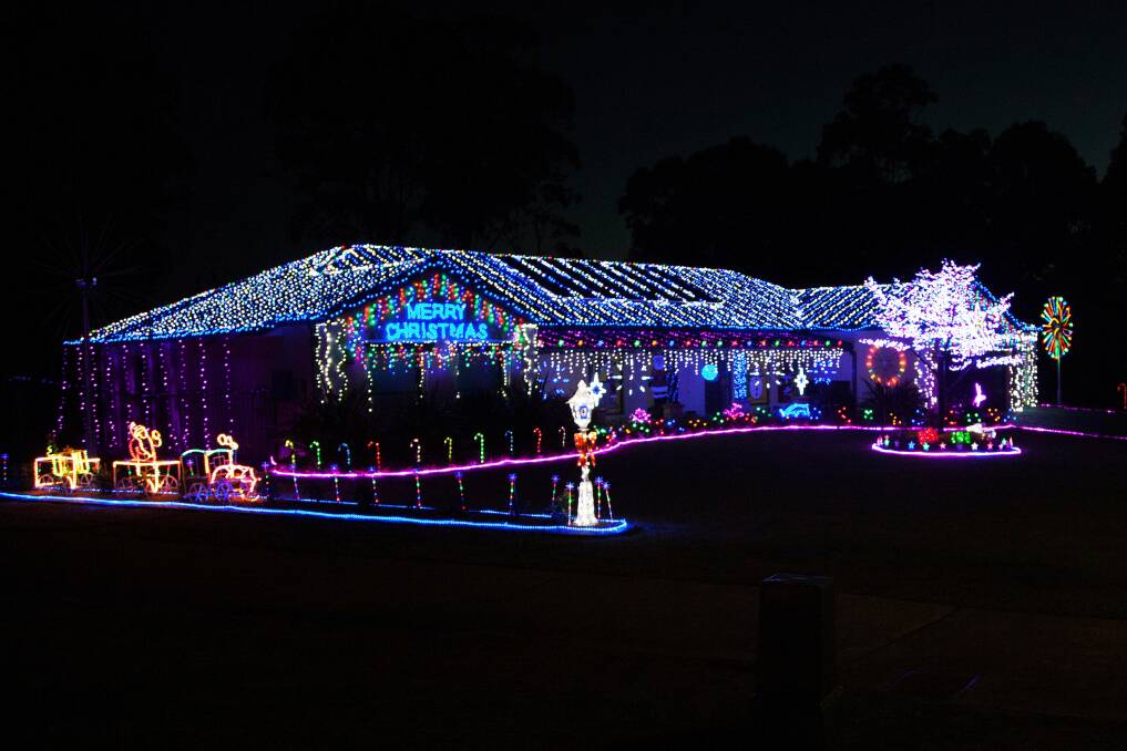 MAGICAL: A house in Eagle Close, Medowie, lit up last Christmas.
