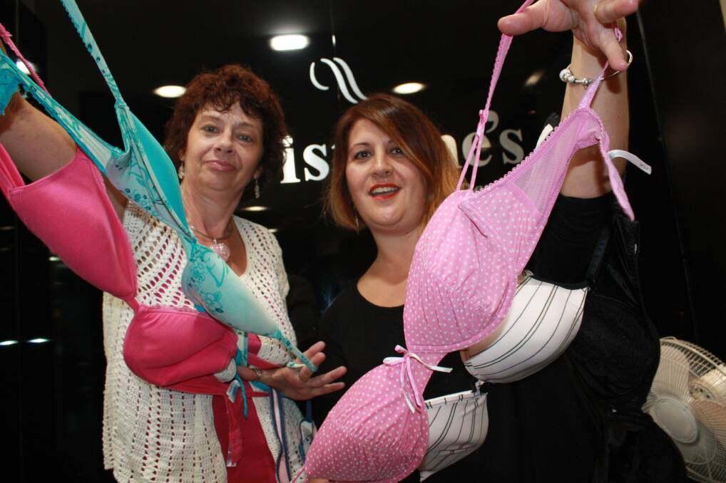 PUSH: Bra collector Tracy Scott with Mira Hrstic from drop-off point Christiane's Hair Design at the Salamander shopping centre. Picture: Stephen Wark