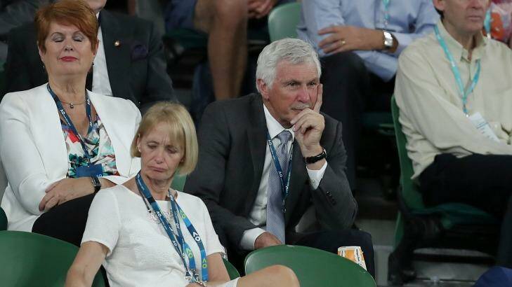 Former AFL coach Mick Malthouse watches from the Presidents' Reserve section on Rod Laver Arena. Photo: Alex Ellinghausen