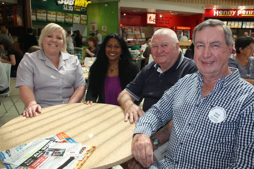 HAND UP: Abby Richards, Dushani Gamage, Tom Lupton and Doug Jacka at Salamander Bay Shopping Centre. Picture: Stephen Wark