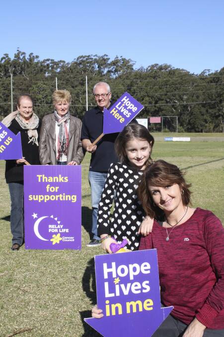 ALL ON AGAIN: Grainne Myles with daughter Jazmin, 7, Sue Sullivan-Gould, Cathy Turner and Glen Parsons prepare for Relay for Life at Tomaree sports complex. Picture: Charles Elias