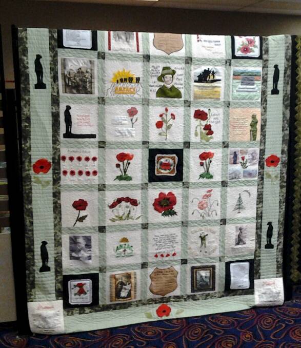COMBINED EFFORT: The centenary quilt on route to Gallipoli for this year's Anzac Day dawn service.