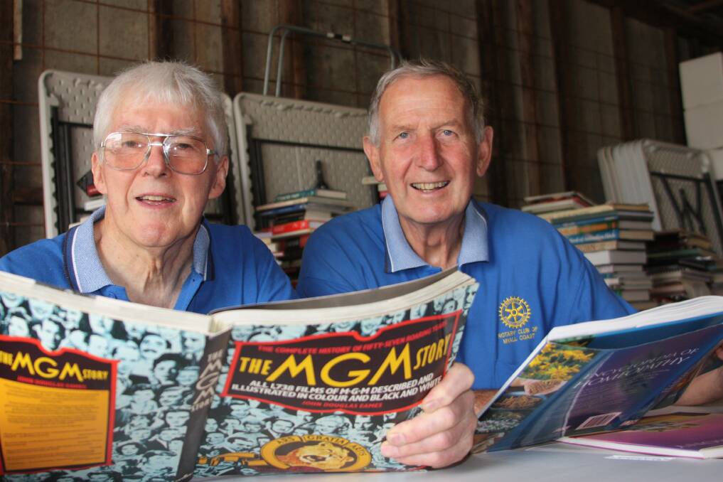 BOOK BONANZA: Myall Coast Rotary Club members Ray Harrison and Paul Dewar are getting ready for the big Easter book sale. Picture:Ellie-Marie Watts