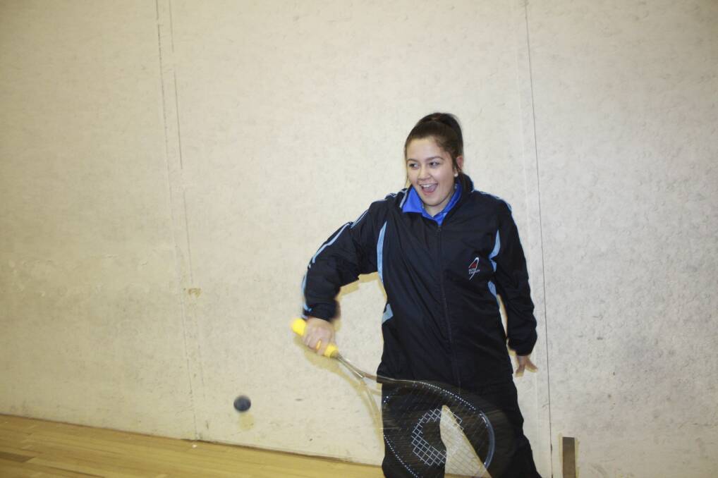 ON HER WAY: Claire Flannery-Livingstone, 14, at the Shoal Bay squash courts. Picture: Stephen Wark
