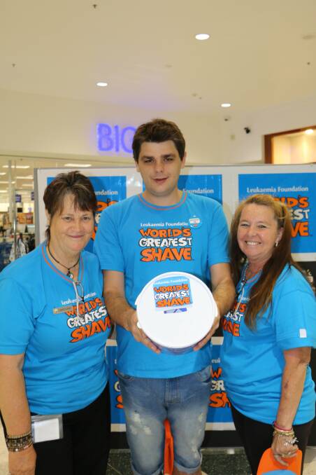 HAIR TODAY: Raymond Terrace Big W staff members Maryjane Fitzgerald, Chris Cummings and Mavis Whitfall shaved their heads for the World's Greatest Shave. Picture: Ellie-Marie Watts