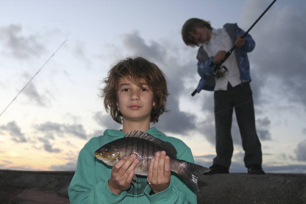 FISHOS: Young champs Sebastien and Noah Brown enjoy luderick fishing.