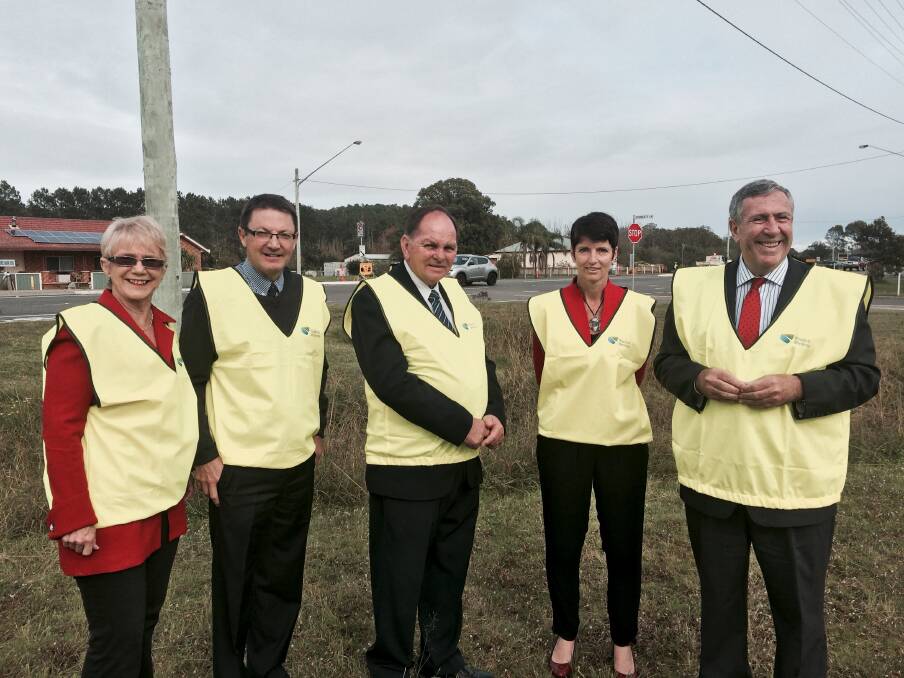 ALL GO: At the opening of the latest stage of the Nelson Bay Road upgrade are Cr Sally Dover, Scott MacDonald, Maitland mayor Peter Blackmore, Port Stephens MP Kate Washington and Duncan Gay. Picture: Supplied