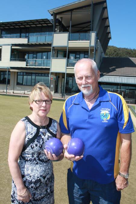 BOWLS FOR BARBIES: Rotary's Janelle Upton and Peter Ridgeway at Nelson Bay Bowling Club. Picture: Stephen Wark