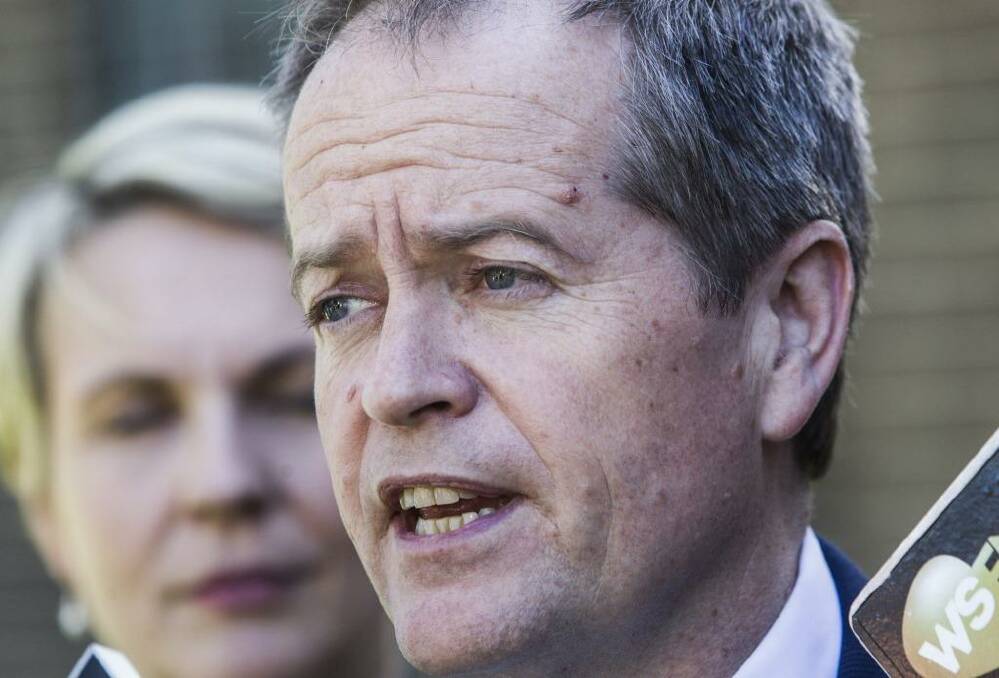 Labor leader Bill Shorten has again called for the Abbott government to consider a ban on Vladimir Putin attending the G20 summit in November. Photo: Nic Walker
