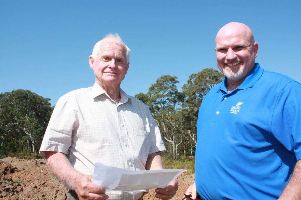 ROW: Mayor Bruce MacKenzie with deputy Chris Doohan on the dirt mound to be used for the BMX track. Picture: Stephen Wark