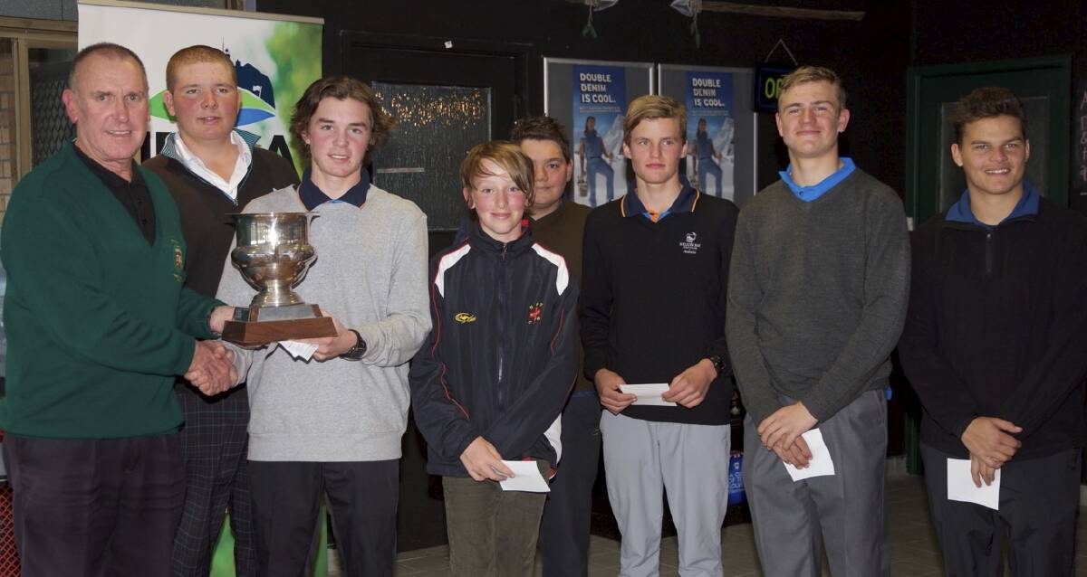 HISTORIC: Newcastle District Golf junior pennant manager Don Nelson with the victorious players holding the Merv England Trophy. (From left) Carter Nepia, Harry Richards, Harry Cleare, Jaylin Lilly, Andrew Lange, Callum Gascoigne and Elijah Startin. Absent: Connor Benjamin. Picture: Supplied