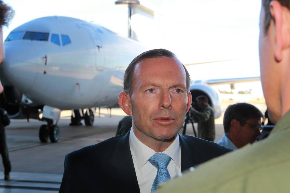 VISIT: Prime Minister Tony Abbott visits RAAF Base Williamtown. 
Photo: Department of Defence.