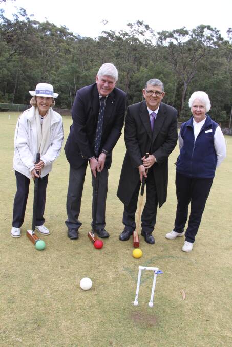 GAME TIME: Nelson Bay Croquet Club life member Margaret Thompson, Port Stephens MP Craig Baumann, Minister for Ageing John Ajaka and club president Jann Thomas. Picture: Supplied