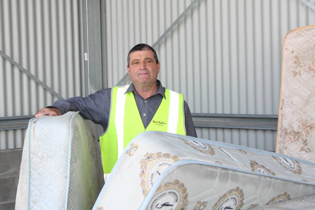 BRING THEM HERE: Paul Gallagher from the Waste Transfer Station wants your mattress. Picture: Stephen Wark