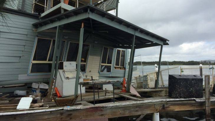 Milanos On The Lake has partially collapsed into Lake Macquarie. Photo: Fire & Rescue NSW