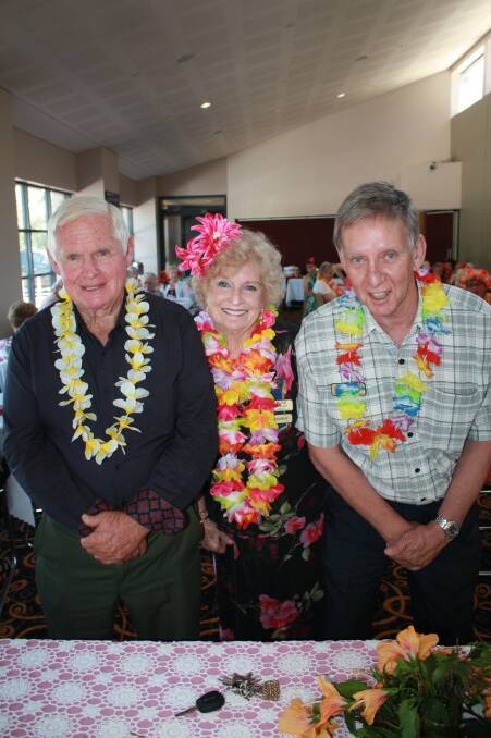ALOHA: Bruce Mackenzie, June Lethorn and Ian Harding get into the spirit of the event.